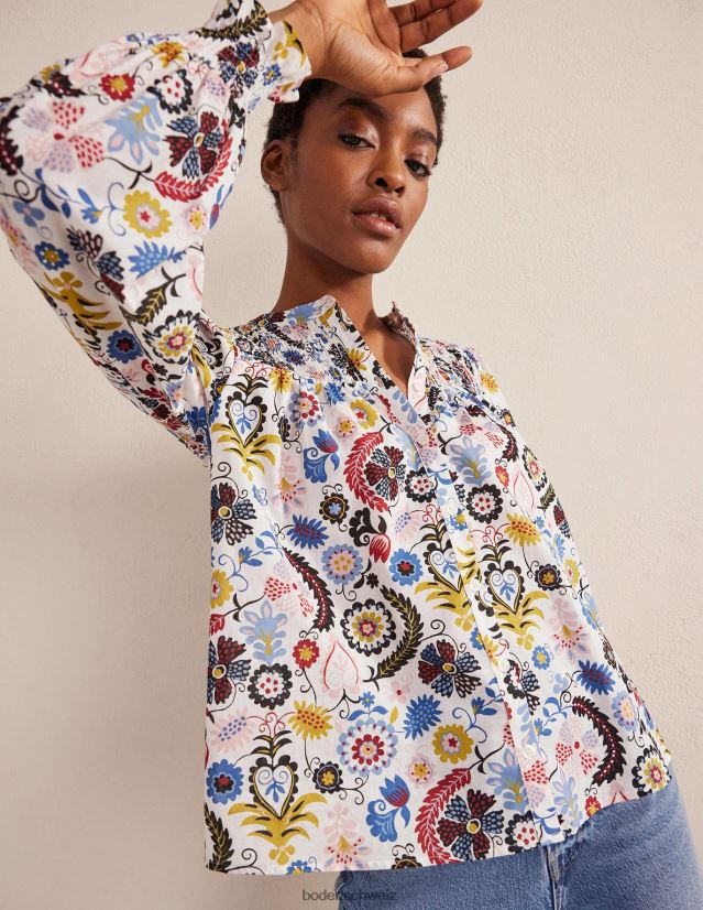 Boden Frauen Gesmokte Baumwollbluse mit Passe VH86PT1871 Kleidung Elfenbein und tropischer Charme